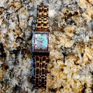 Skagen rose gold, stainless steel, mother of pearl & cubic zirconia face.